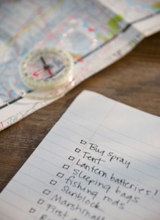 Packing list, compass and map