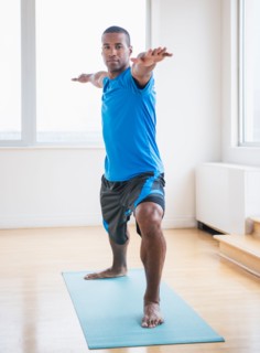 Young man practicing yoga