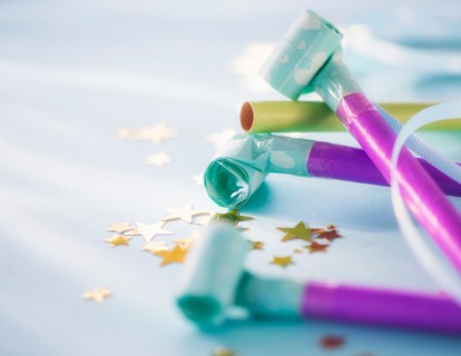 Studio shot of party blowers and confetti
