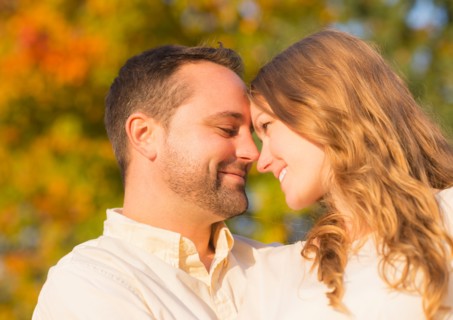 Couple smiling outdoors