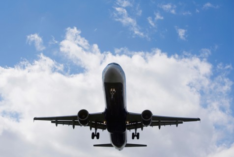 Low angle view of flying airplane