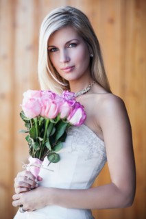 Portrait of bride holding bouquet