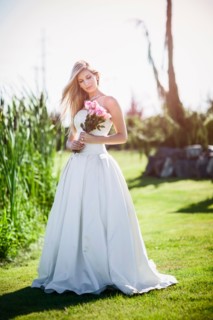 Portrait of bride holding bouquet