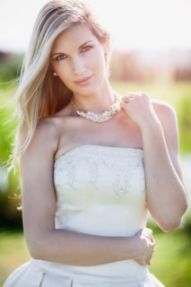 Portrait of bride posing outdoors