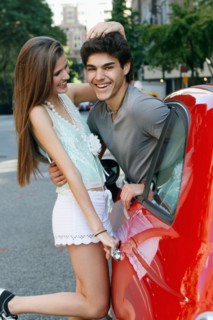 Young couple embracing on street
