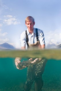 Man holding western cutthroat trout c