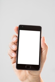 Hand holding smartphone.