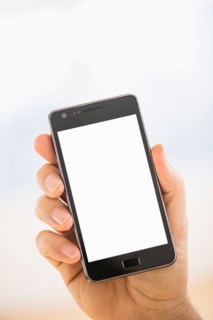 Hand holding smartphone.