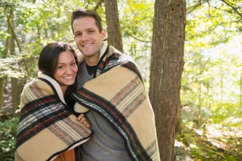 Portrait of couple in forest. Photo: Jamie Grill