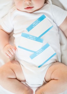Identity labels belly of baby boy (2-5 months). Photo : Jamie Grill