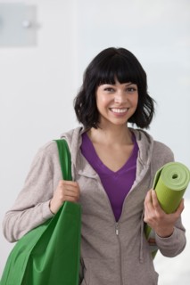 Portrait of young woman going for fitness. Photo : Dan Bannister
