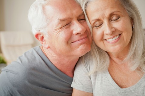 Portrait of senior couple in close embrace. Photo : Rob Lewine