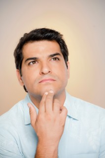 Portrait of man looking up. Photo : Rob Lewine