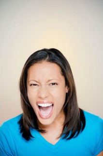 Portrait of woman screaming. Photo: Rob Lewine