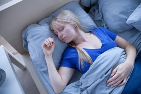 Elevated view of sleeping woman. Photo : Rob Lewine