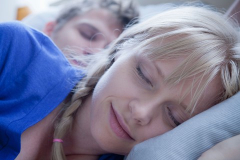 Close up of sleeping couple. Photo : Rob Lewine