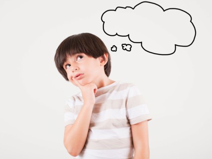 Studio shot of boy (6-7) with thought bubble. Photo: Jessica Peterson