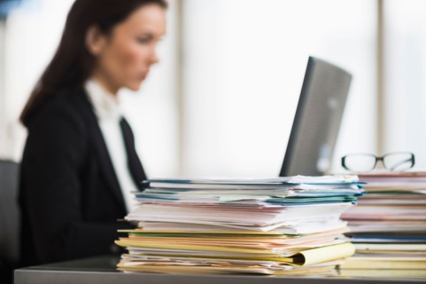 Businesswoman working in office.