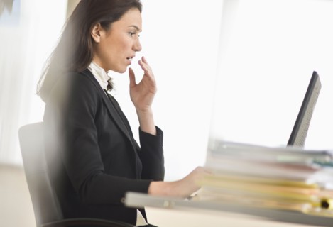 Businesswoman using computer.