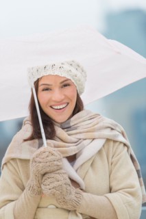 Portrait of woman with umbrella.