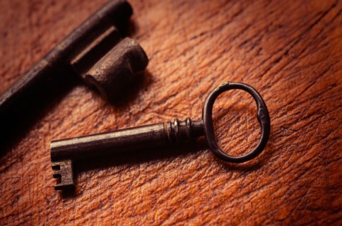 Antique keys on wood.
