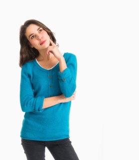 Studio shot of pensive young woman.