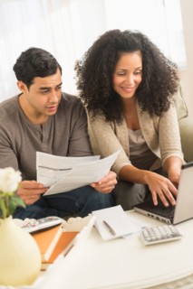 Couple doing home finances.