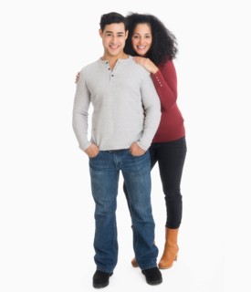 Studio portrait of young couple.