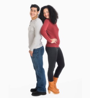 Studio portrait of young couple.