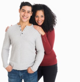 Studio portrait of young couple.