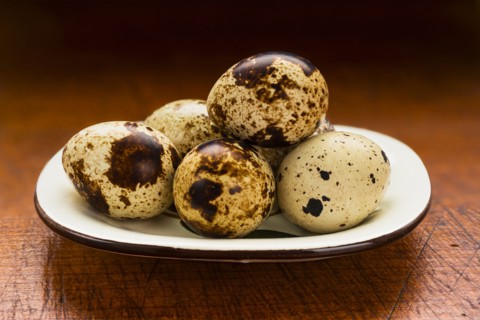 Quail eggs on table.