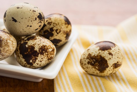 Quail eggs on table.