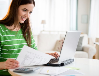 Young woman using laptop