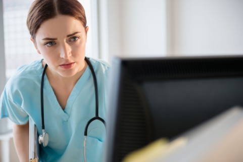 Portrait of female doctor in hospital uniform