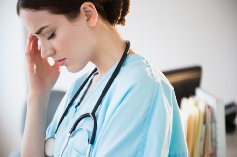 Portrait of female doctor in hospital uniform