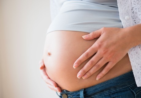 Close-up of pregnant woman's belly