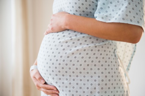 Pregnant woman in hospital outfit