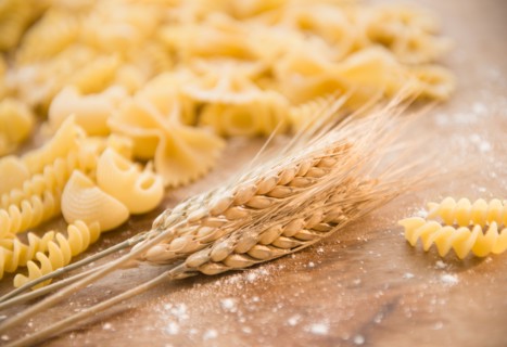 Different types of pasta and wheat ear