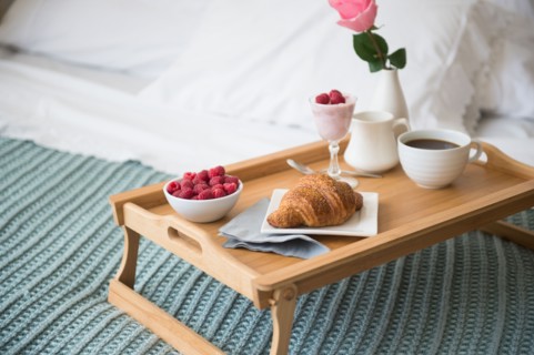 Breakfast plate on bed