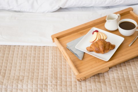 Breakfast plate on bed