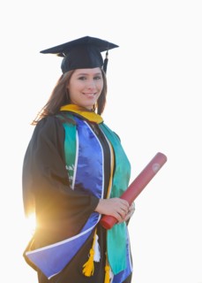 Portrait of graduate student holding diploma
