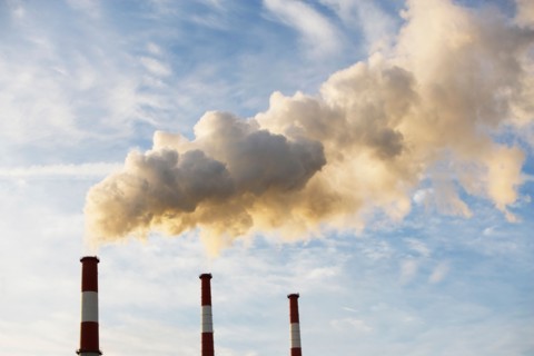 Smoke emitting from smoke stacks