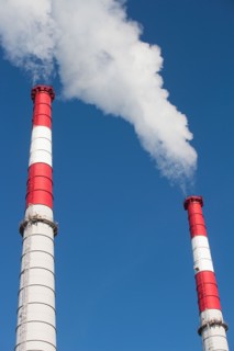 Smoke emitting from smoke stacks