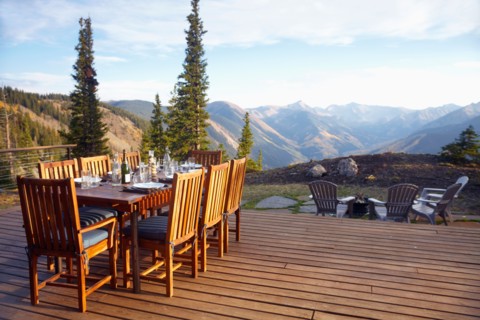 Outdoor table and chairs on wooden terrace
