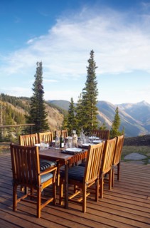 Outdoor table and chairs on wooden terrace