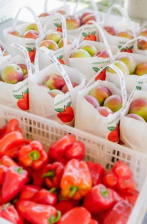 Apples and red peppers ready to be bought