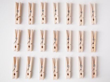 Studio Shot of rows of clothespins