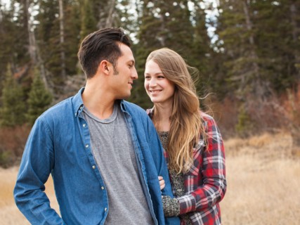 Portrait of young couple in non-urban scene