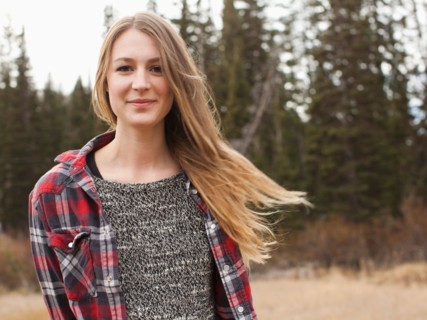 Portrait of young woman in non-urban scene