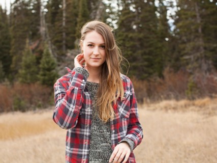 Portrait of young woman in non-urban scene